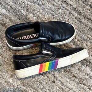 Authentic Burberry Black Leather Slip-On Shoes.